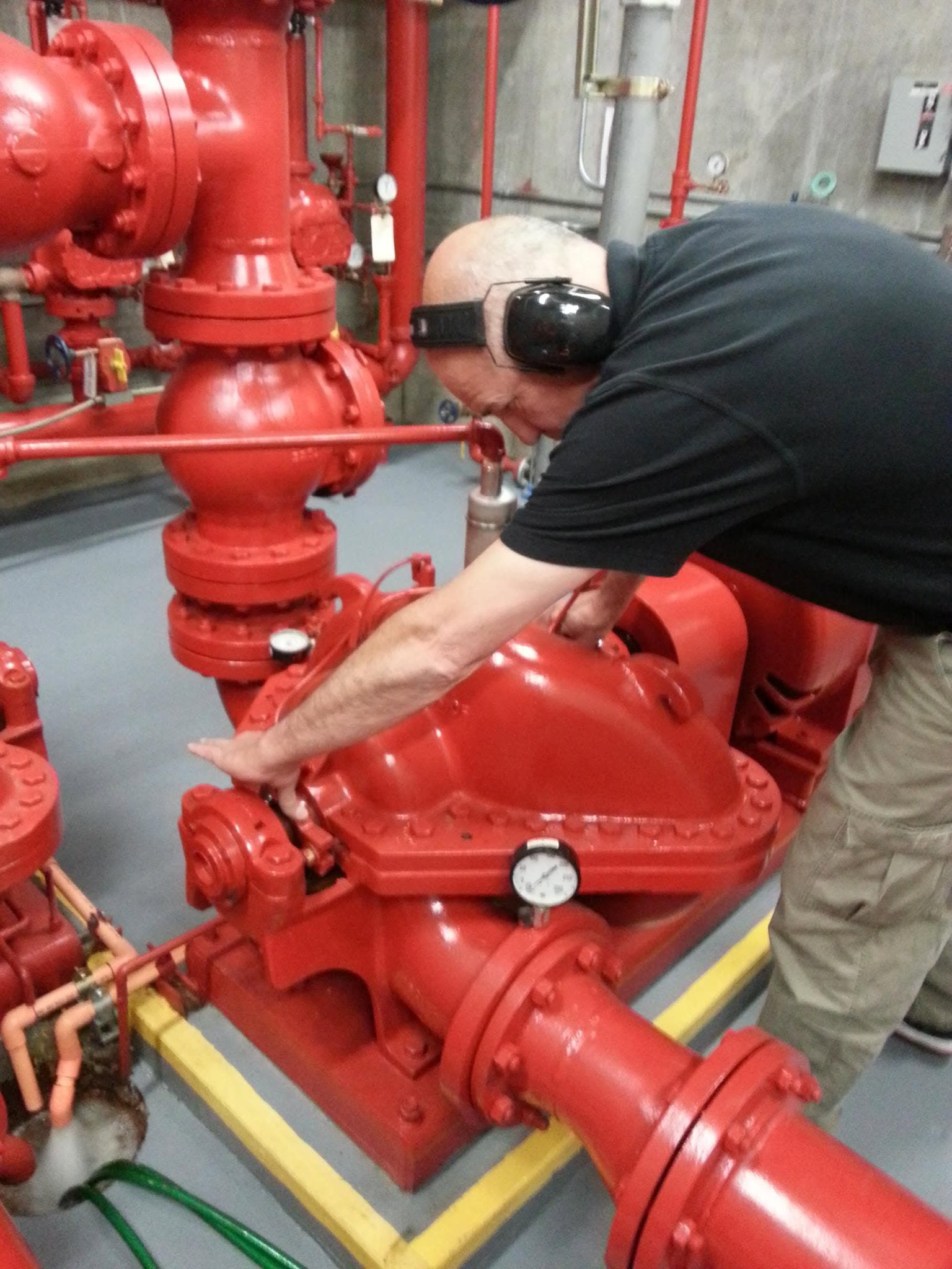 Tross operating engineer servicing a fire pump — Portland